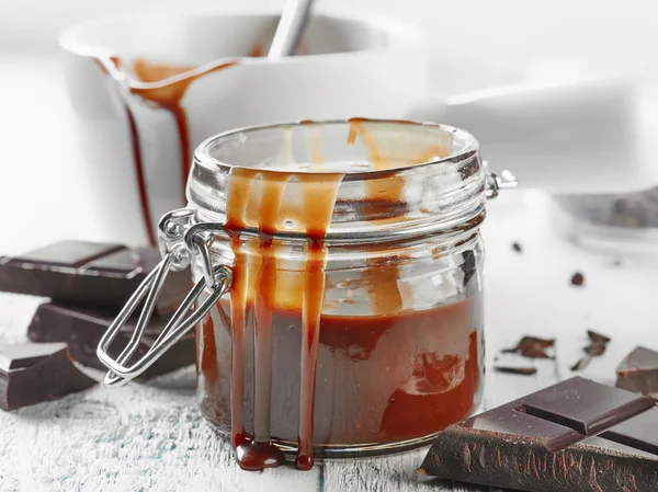 Jar of chocolate sauce — Stock Photo, Image