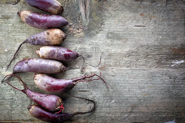 Beet roots on wooden table — Stock Photo, Image