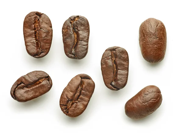 Feijões de café isolados em branco — Fotografia de Stock