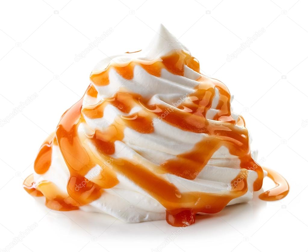 whipped cream with caramel sauce on white background