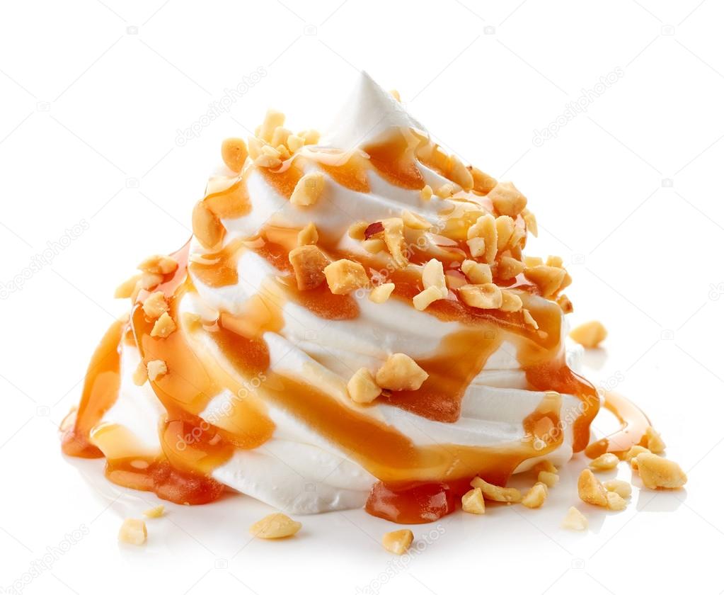 Whipped cream with caramel sauce on white background — Stock Photo