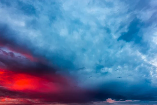 Sunset clouds with storm clouds