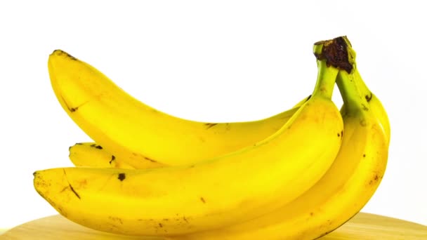 Branch of bananas rotates on a white background — Stock Video