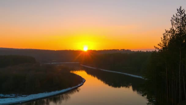 Winter sunset over the river, time-lapse — Stock Video