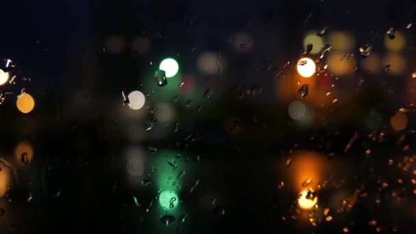 Дощ на склі, абстрактний фон — стокове відео