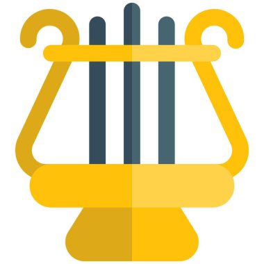 Antik arp müzik enstrümanı büyük iplerle bağlanmış.