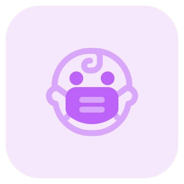 Bebek Covid-19 'un korunması için maske takıyor.