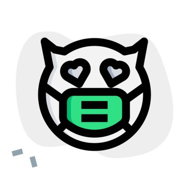 Maske takan şeytan emojisinin gözleri.