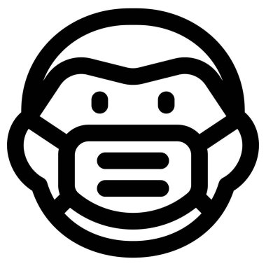 Covid-19 salgını sırasında maskeyi takan olgun bir adam.