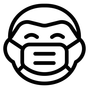 Yetişkin adam maske takarken sırıtıyor.