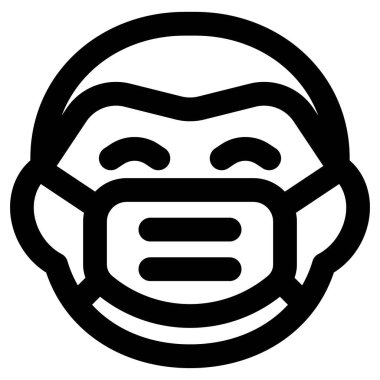 Yetişkin adam maske takarken sırıtıyor.