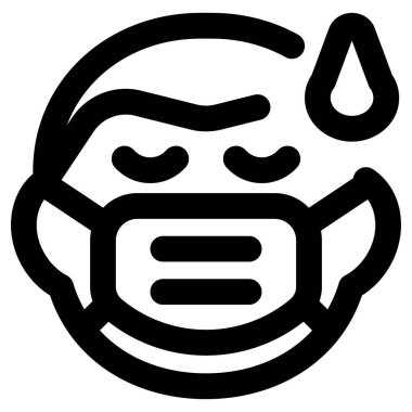 Yorgun adam yüz maskesi takarken terliyor.