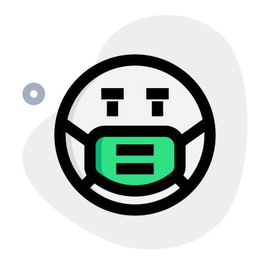 Koronavirüs paniği nedeniyle maske takarken ciddi emoji.