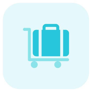 Ağır bagajlar bir yük arabasıyla bir tesise taşınıyor.