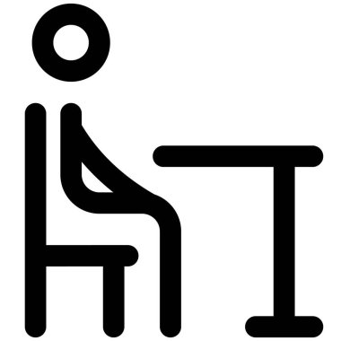 Sandalyede otururken ders çalışmak için sınıf odası