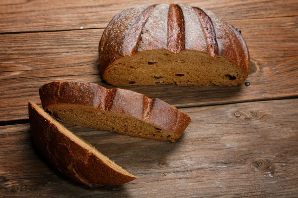 Pieces of rye bread on a rural table — Stock Photo, Image