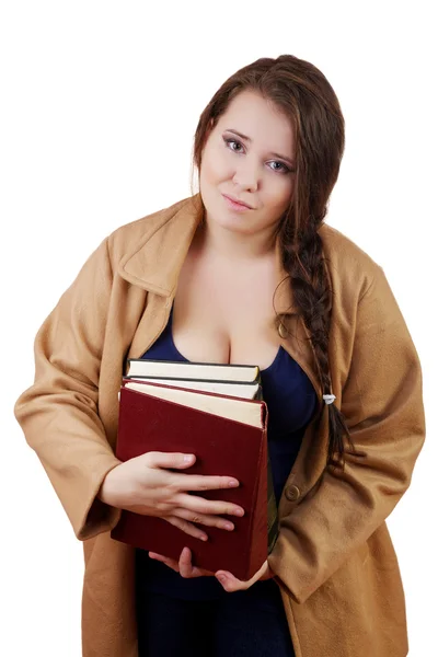Plus grootte vrouw met dikke volumes van boeken op een witte pagina — Stockfoto