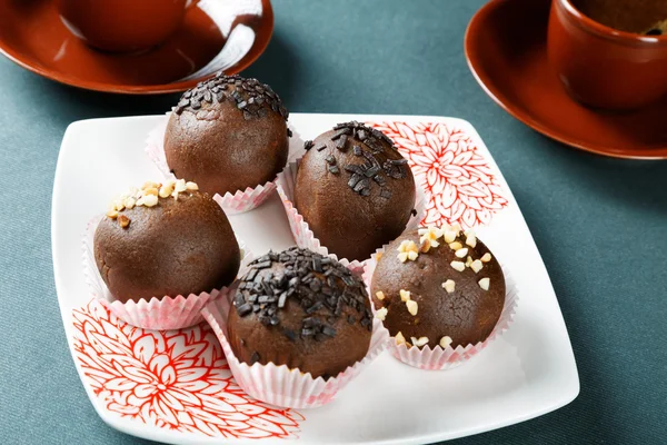 Still-life with a cup of coffee and cakes — Stock Photo, Image