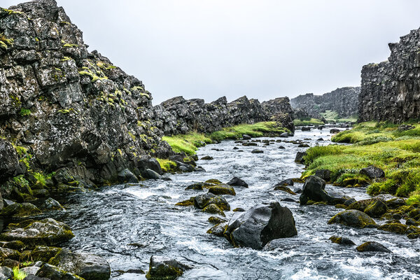 Icelandic river with moss rocks