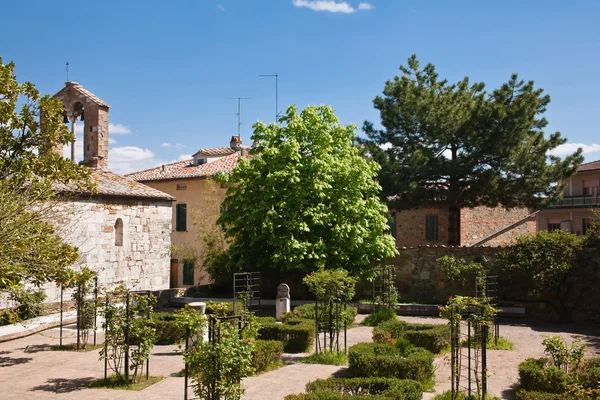 Old roman church in garden — Stock Photo, Image