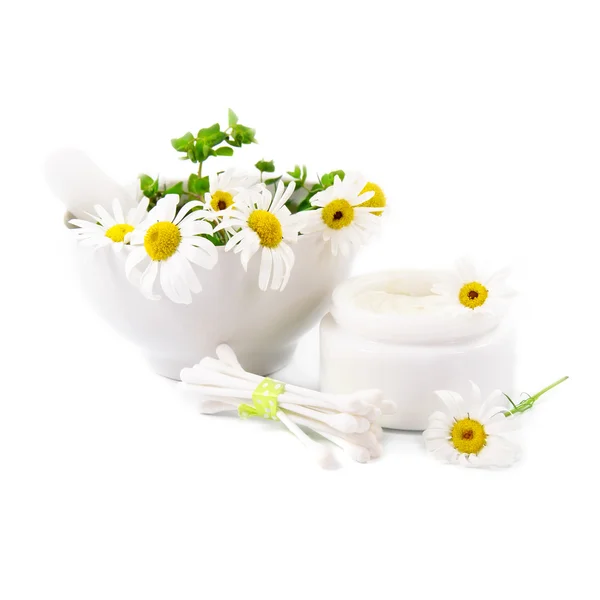 Beautiful daisies, jar of cosmetic cream and hygienic sticks on a white background. — Stock Photo, Image