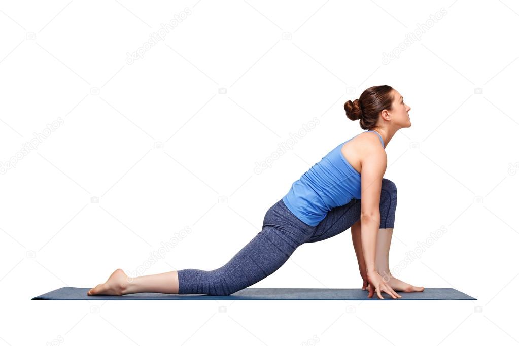 Fit yogini woman practices yoga asana  Anjaneyasana