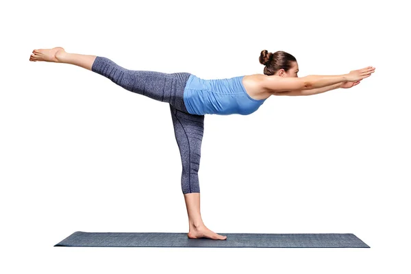 Deportiva mujer en forma practica yoga asana utthita Virabhadrasana 3 —  Fotos de Stock