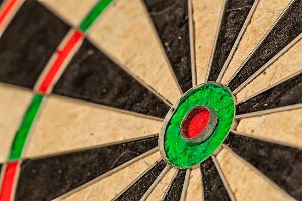 Dart i bulls eye närbild — Stockfoto