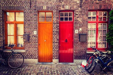 Doors of old houses in Bruges, Belgium clipart
