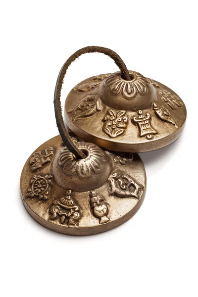Tibetan Buddhist tingsha cymbals isolated — Stock Photo, Image