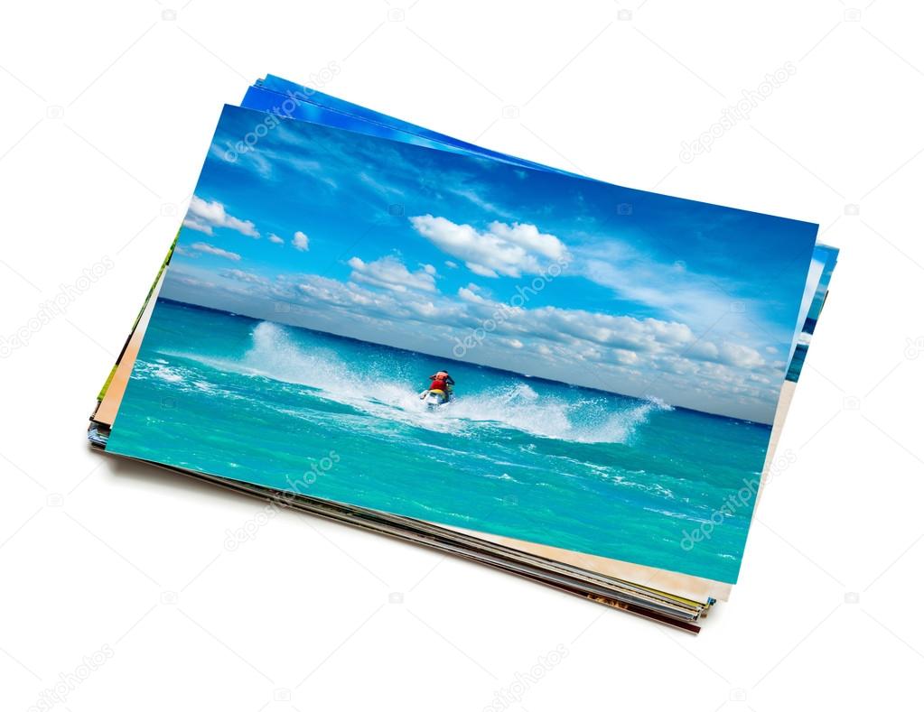 Stack of vacation photos isolated