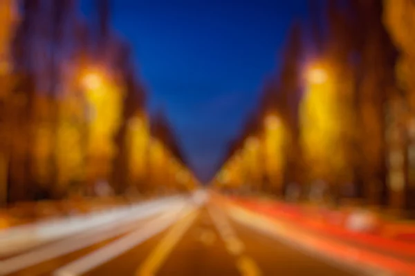 Hintergrund der Straße am Abend verschwommen — Stockfoto