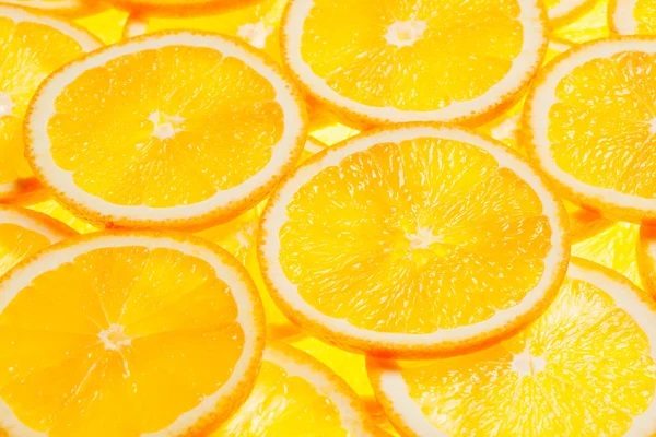 Colorful orange fruit slices Stock Image