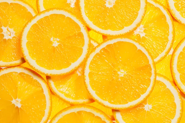 Colorful orange fruit slices Stock Picture