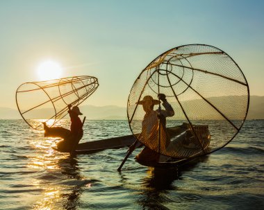 Burmese fisherman at Inle lake, Myanmar clipart