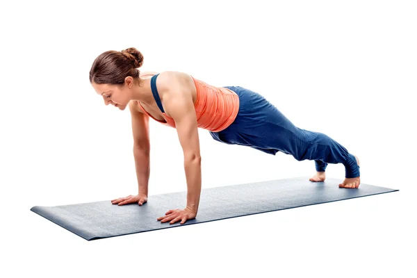 Young fit sporty woman does Hatha yoga plank asana — Stock Photo, Image
