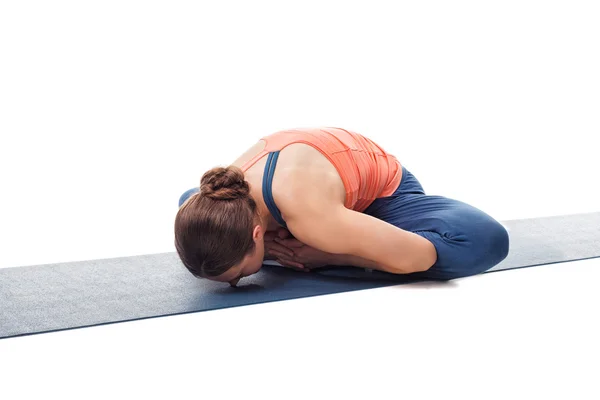 Woman practices yoga asana Baddha konasana Royalty Free Stock Photos