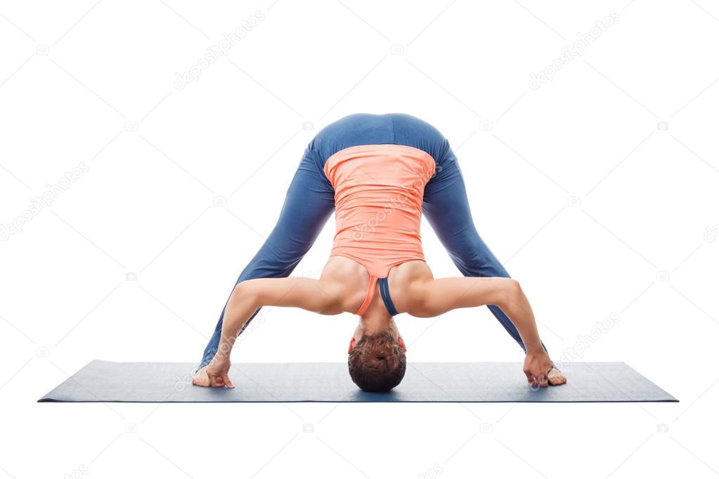 Woman doing yoga asana Prasarita padottanasana