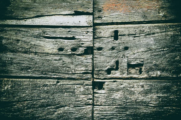 Old door with keyholes — Stock Photo, Image