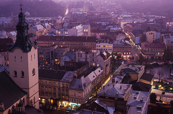 Twilight view of weatern european city Lviv, architecture background