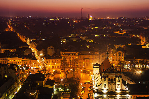 Night view of weatern european city Lviv, architecture background