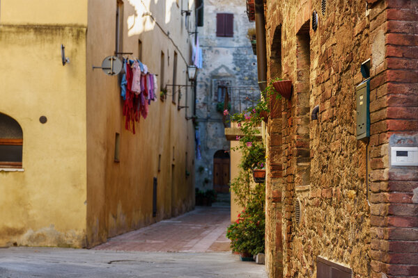 View of the ancient old european city. Street of Pienza, Italy.
