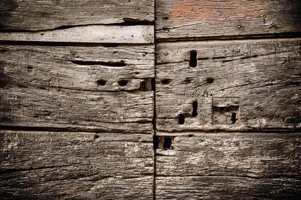 Old door with keyholes — Stock Photo, Image