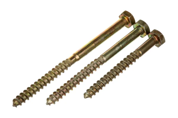 Three brass screws Stock Photo