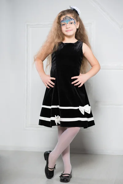 Young girl in black dress — Stock Photo, Image