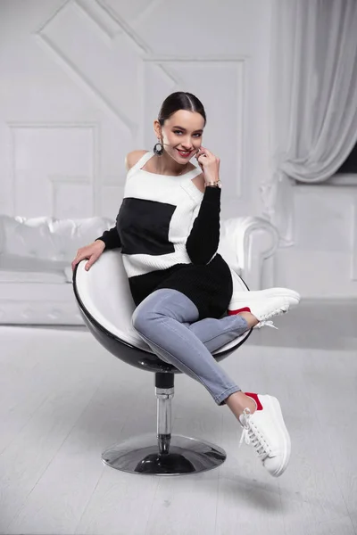 Smile Woman Dressed Sweater Jeans Sitting Armchair — Foto Stock