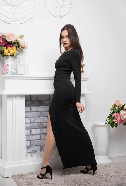 Charming Young Brunette Wearing Long Evening Dress Posing Fireplace — Fotografia de Stock