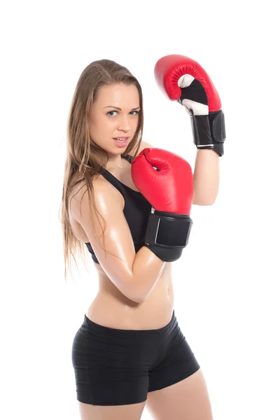Mujer posando en guantes de boxeo rojos — Foto de Stock