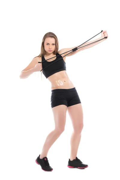 Mujer haciendo ejercicios con expansor — Foto de Stock