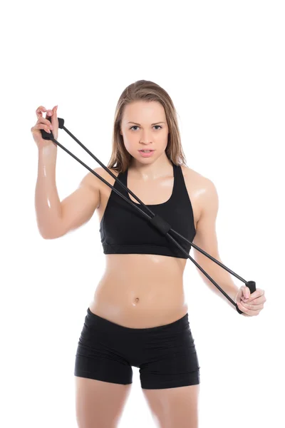 Mujer de negro posando con expansor —  Fotos de Stock